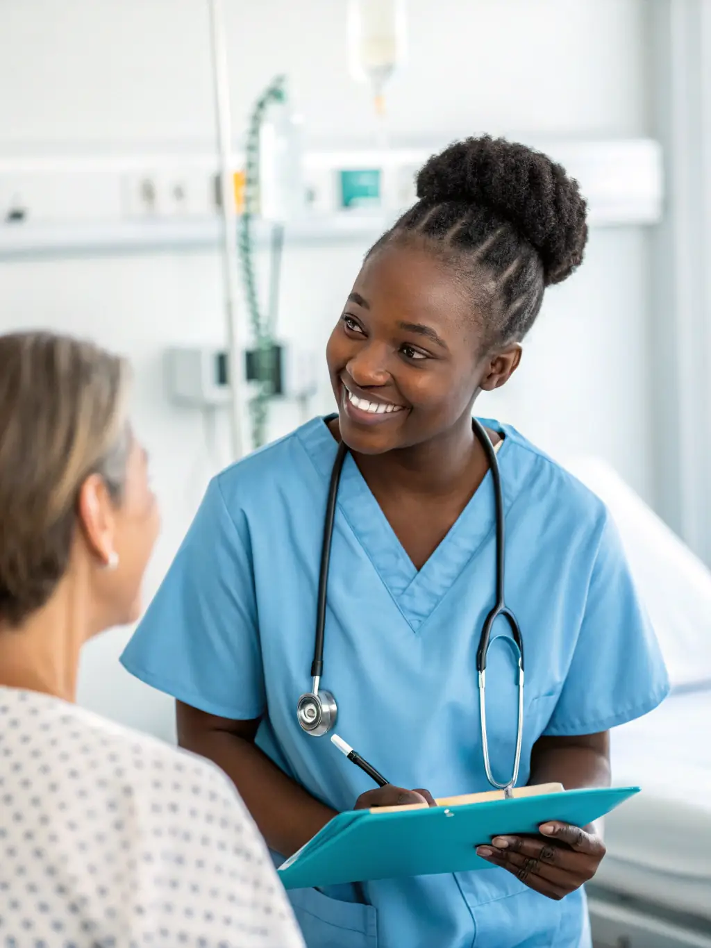 A healthcare professional consulting with a patient about their dialysis treatment plan, highlighting AURAL's personalized approach to patient care.